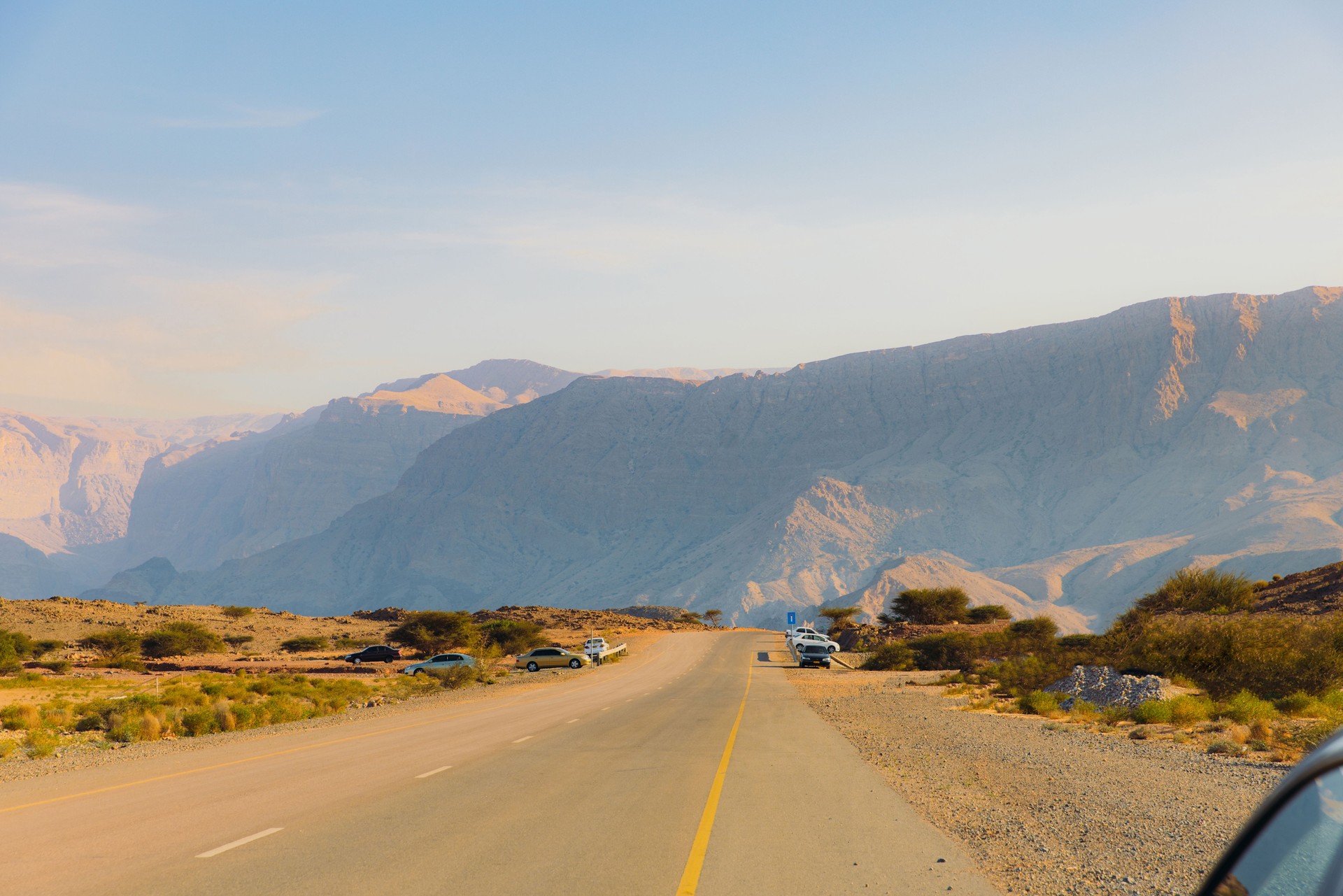 Pit Stop at Scenic Mountain Road During Road Trip in Oman